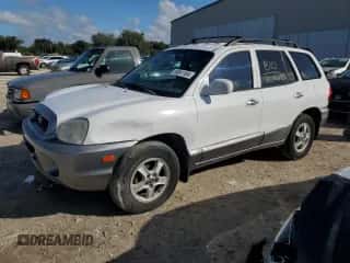 2001 Hyundai Santa Fe GLS с VIN KM8SC83D91U048535, выставлен на аукционе Copart как лот 85041184 с пробегом 218 621 миль миль и Списание • Salvage title. История ставок и продаж доступна на DreamBid. Изображение 1.