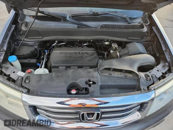 2015 Honda Pilot LX z VIN 5FNYF4H25FB060218, wystawiony jako Copart lot #82473835 z przebiegiem 83 803 mil mil oraz Szkoda całkowita • Salvage title. Historia ofert i sprzedaży dostępna na DreamBid. Obrazek 12.