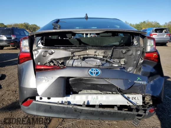 2020 Toyota Prius LE with VIN JTDL9RFU4L3014858, listed as a Copart auction lot 84888675 with 52,063 mi miles and Salvage title. Bid and sale history available at DreamBid. Image 6.