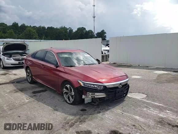 2019 Honda Accord EX-L z VIN 1HGCV2F5XKA000647, wystawiony jako Copart lot #66940545 z przebiegiem 125 179 mil mil oraz Szkoda całkowita • Salvage title. Historia ofert i sprzedaży dostępna na DreamBid. Obrazek 14.