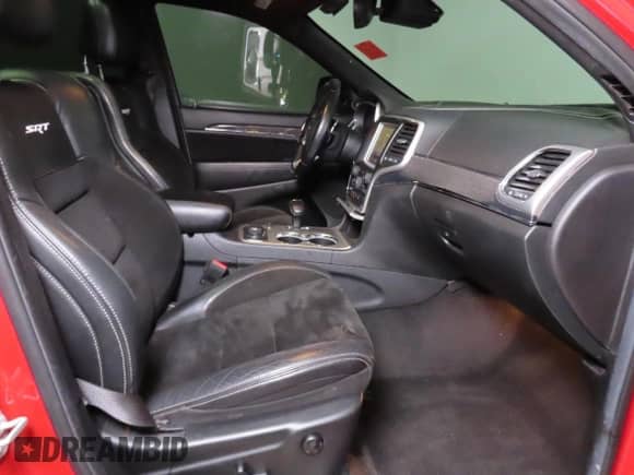 2014 Jeep Grand Cherokee SRT-8 z VIN 1C4RJFDJ9EC389009, wystawiony jako Copart lot #86140085 z przebiegiem 128 339 mil mil oraz Szkoda całkowita • Salvage title. Historia ofert i sprzedaży dostępna na DreamBid. Obrazek 5.