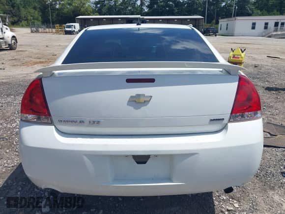 2014 Chevrolet Impala LTZ with VIN 2G1WC5E30E1181722, listed as a IAAI auction lot 42972885 with 122,847 mi miles and . Bid and sale history available at DreamBid. Image 16.