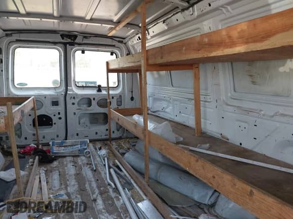 1999 Ford Econoline Cargo with VIN 1FTRE1420XHA34056, listed as a IAAI auction lot 41998411 with 236,267 mi miles and . Bid and sale history available at DreamBid. Image 8.