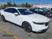 2023 Honda Accord Touring with VIN 1HGCY2F81PA021542, listed as a IAAI auction lot 43470058 with 59,980 mi miles and . Bid and sale history available at DreamBid. Image 1.