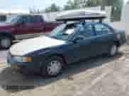 1995 Toyota Camry DX z VIN 4T1SK11E5SU487271, wystawiony jako IAAI lot #42949922 z przebiegiem 288 591 mil mil oraz . Historia ofert i sprzedaży dostępna na DreamBid. Obrazek 2.