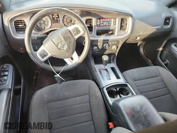 2013 Dodge Charger SE z VIN 2C3CDXBG9DH689787, wystawiony jako Copart lot #81855715 z przebiegiem 106 996 mil mil oraz Szkoda całkowita • Salvage title. Historia ofert i sprzedaży dostępna na DreamBid. Obrazek 8.