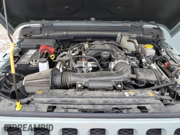 2023 Jeep Wrangler Sport with VIN 1C4HJXAG0PW595881, listed as a Copart auction lot 65590025 with 19,597 mi miles and Salvage title. Bid and sale history available at DreamBid. Image 12.