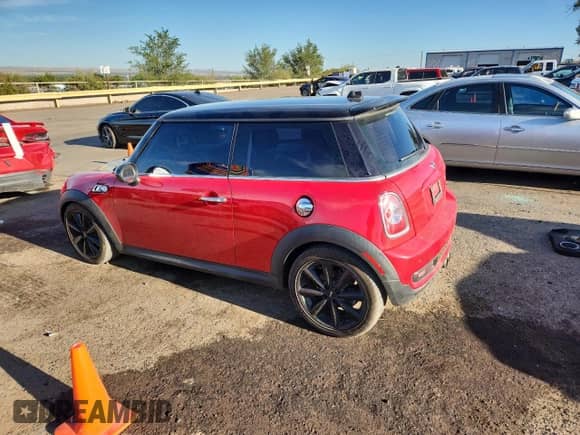 2012 MINI Hardtop S with VIN WMWSV3C56CTY25916, listed as a Copart auction lot 80962285 with 118,668 mi miles and Salvage title. Bid and sale history available at DreamBid. Image 2.
