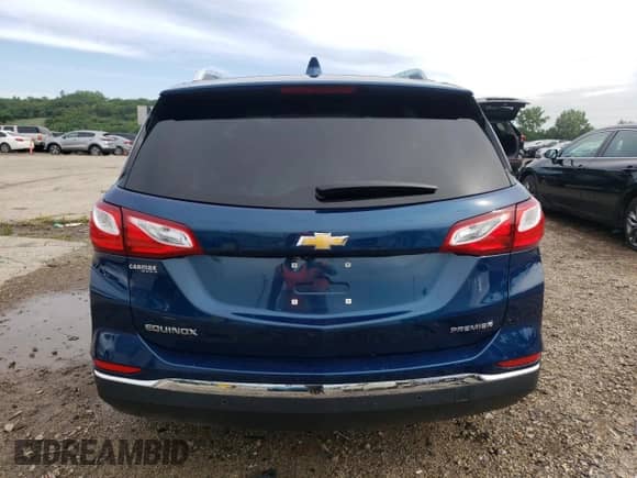 2021 Chevrolet Equinox Premier с VIN 2GNAXNEV7M6146689, выставлен на аукционе Copart как лот 64985155 с пробегом 31 140 миль миль и Списание • Salvage title. История ставок и продаж доступна на DreamBid. Изображение 6.