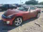 2009 Saturn Sky Red Line with VIN 1G8MF35XX9Y100011, listed as a Copart auction lot 57884065 with 104,714 mi miles and Salvage title. Bid and sale history available at DreamBid. Image 1.