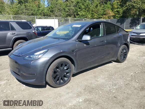 2021 Tesla Model Y Long Range with VIN 5YJYGAEE9MF296278, listed as a Copart auction lot 85291245 with 72,651 mi miles and Salvage title. Bid and sale history available at DreamBid. Image 1.