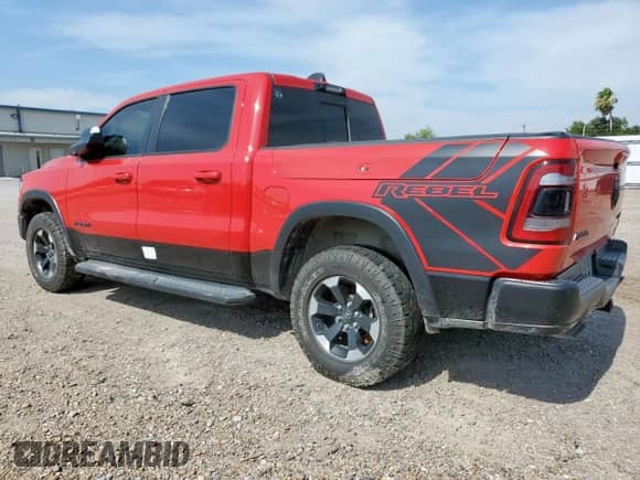 2022 Ram 1500 Rebel z VIN 1C6SRFLM7NN414619, wystawiony jako Copart lot #56697775 z przebiegiem 57 054 mil mil oraz Szkoda całkowita • Salvage title. Historia ofert i sprzedaży dostępna na DreamBid. Obrazek 2.