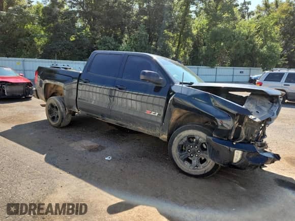 2018 Chevrolet Silverado 1500 LTZ с VIN 3GCUKSEC0JG195220, выставлен на аукционе Copart как лот 71734315 с пробегом 131 425 миль миль и Списание • Salvage title. История ставок и продаж доступна на DreamBid. Изображение 4.