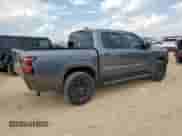2023 Nissan Frontier Pro-4X with VIN 1N6ED1EKXPN669106, listed as a Copart auction lot 70160965 with 14,875 mi miles and Salvage title. Bid and sale history available at DreamBid. Image 3.