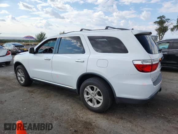 2013 Dodge Durango Crew с VIN 1C4SDJDT4DC590294, выставлен на аукционе Copart как лот 69662765 с пробегом 185 309 миль миль и Списание • Salvage title. История ставок и продаж доступна на DreamBid. Изображение 2.