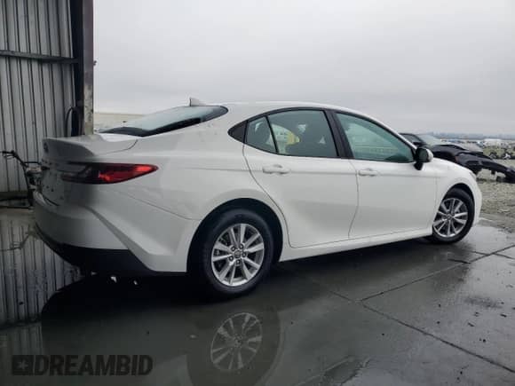 2025 Toyota Camry LE с VIN 4T1DAACKXSU059677, выставлен на аукционе Copart как лот 90298405 с пробегом 26 148 миль миль и Чистый • Clean title. История ставок и продаж доступна на DreamBid. Изображение 3.