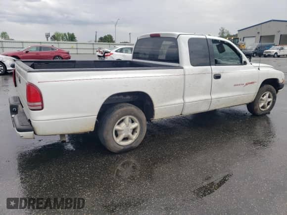 1998 Dodge Dakota SLT с VIN 1B7GL22X6WS693570, выставлен на аукционе Copart как лот 52000825 с пробегом 125 985 миль миль и Списание • Salvage title. История ставок и продаж доступна на DreamBid. Изображение 3.