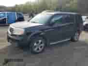 2013 Honda Pilot EX-L with VIN 5FNYF4H73DB028828, listed as a Copart auction lot 80372355 with 135,085 mi miles and Salvage title. Bid and sale history available at DreamBid. Image 1.