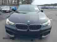 2019 BMW 7 Series 740i with VIN WBA7E2C57KB217973, listed as a IAAI auction lot 39064321 with 54,818 mi miles and . Bid and sale history available at DreamBid. Image 12.