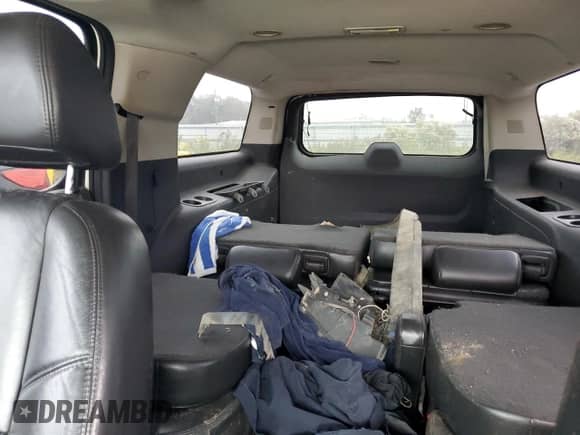 2008 Chevrolet Suburban LTZ с VIN 1GNFC160X8R197997, выставлен на аукционе Copart как лот 79452344 с пробегом Не указан миль и Списание • Salvage title. История ставок и продаж доступна на DreamBid. Изображение 10.