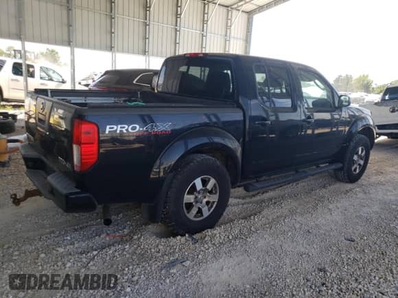2010 Nissan Frontier LE with VIN 1N6AD0EV3AC447402, listed as a Copart auction lot 70261595 with 159,170 mi miles and Salvage title. Bid and sale history available at DreamBid. Image 3.