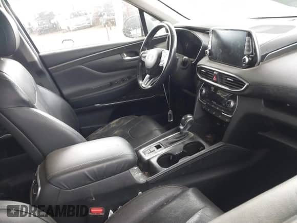 2020 Hyundai Santa Fe Limited with VIN 5NMS53AA1LH220156, listed as a IAAI auction lot 42181295 with 52,867 mi miles and . Bid and sale history available at DreamBid. Image 5.