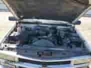 2000 Chevrolet Silverado 3500 z VIN 1GCGC34R9YR207610, wystawiony jako Copart lot #56242995 z przebiegiem 132 705 mil mil oraz Szkoda całkowita • Salvage title. Historia ofert i sprzedaży dostępna na DreamBid. Obrazek 11.