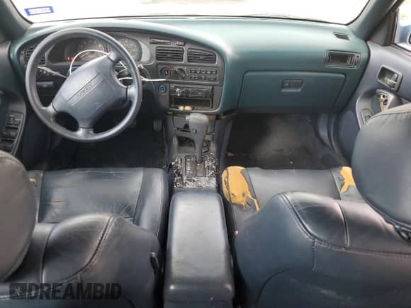 1993 Toyota Camry с VIN 4T1VK13E8PU055730, выставлен на аукционе Copart как лот 58357304 с пробегом 134 700 миль миль и Списание • Salvage title. История ставок и продаж доступна на DreamBid. Изображение 8.