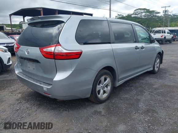 2019 Toyota Sienna L with VIN 5TDZZ3DC2KS005851, listed as a IAAI auction lot 41992778 with 99,580 mi miles and . Bid and sale history available at DreamBid. Image 4.