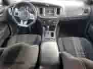 2013 Dodge Charger SRT-8 Super Bee with VIN 2C3CDXGJ2DH570998, listed as a Copart auction lot 56791395 with 67,272 mi miles and Salvage title. Bid and sale history available at DreamBid. Image 8.