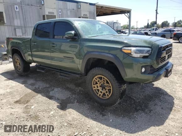 2022 Toyota Tacoma SR5 с VIN 3TMDZ5BN5NM125044, выставлен на аукционе Copart как лот 57896905 с пробегом 35 085 миль миль и Чистый • Clean title. История ставок и продаж доступна на DreamBid. Изображение 4.