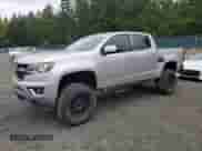 2017 Chevrolet Colorado 4WD Z71 with VIN 1GCPTDE17H1245575, listed as a Copart auction lot 84303515 with 127,760 mi miles and Salvage title. Bid and sale history available at DreamBid. Image 1.