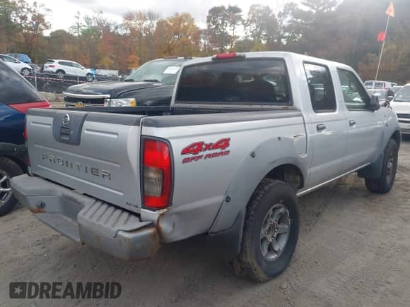 2003 Nissan Frontier XE with VIN 1N6ED27YX3C464642, listed as a IAAI auction lot 43546646 with 143,957 mi miles and . Bid and sale history available at DreamBid. Image 4.