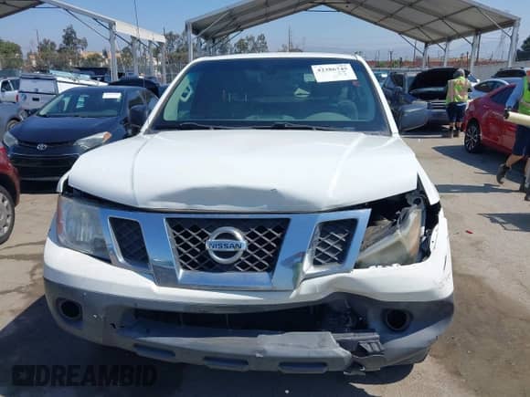 2014 Nissan Frontier S with VIN 1N6BD0CT2EN739140, listed as a IAAI auction lot 42386745 with 169,409 mi miles and . Bid and sale history available at DreamBid. Image 12.