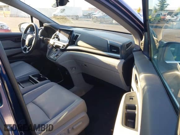 2021 Honda Odyssey EX-L with VIN 5FNRL6H76MB001373, listed as a IAAI auction lot 42951503 with 24,219 mi miles and . Bid and sale history available at DreamBid. Image 5.