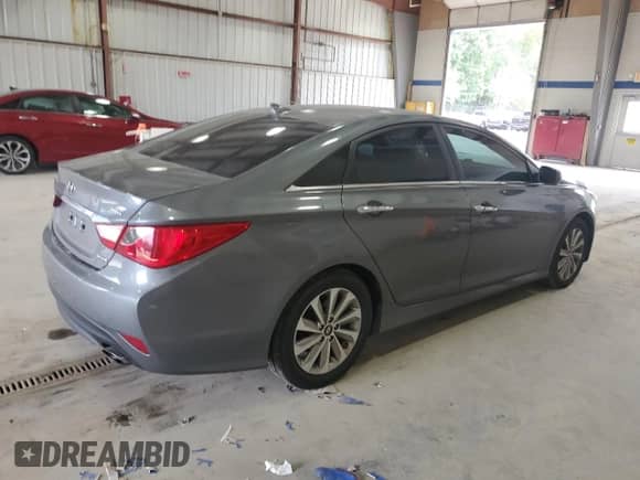 2014 Hyundai Sonata Limited с VIN 5NPEC4AB4EH939134, выставлен на аукционе Copart как лот 85776425 с пробегом 163 412 миль миль и Списание • Salvage title. История ставок и продаж доступна на DreamBid. Изображение 3.