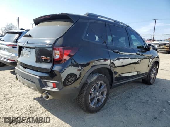 2024 Honda Passport TrailSport with VIN 5FNYF8H67RB010869, listed as a Copart auction lot 50761425 with 5,720 mi miles and Salvage title. Bid and sale history available at DreamBid. Image 3.