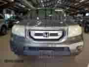 2009 Honda Pilot LX with VIN 5FNYF38219B009703, listed as a Copart auction lot 86054625 with 215,143 mi miles and Clean title. Bid and sale history available at DreamBid. Image 5.