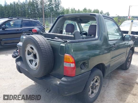 1999 Chevrolet Tracker with VIN 2CNBE18C1X6902538, listed as a IAAI auction lot 42530202 with 247,594 mi miles and . Bid and sale history available at DreamBid. Image 6.