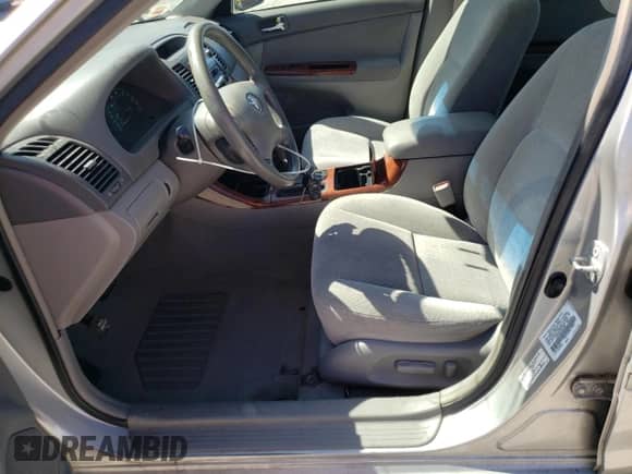 2002 Toyota Camry XLE z VIN 4T1BE32K22U636985, wystawiony jako Copart lot #84587305 z przebiegiem 150 719 mil mil oraz Szkoda całkowita • Salvage title. Historia ofert i sprzedaży dostępna na DreamBid. Obrazek 7.