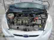 2013 Ford Fiesta S z VIN 3FADP4TJ0DM215363, wystawiony jako Copart lot #58667305 z przebiegiem 109 298 mil mil oraz Czysty tytuł • Clean title. Historia ofert i sprzedaży dostępna na DreamBid. Obrazek 11.
