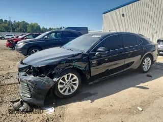 2023 Toyota Camry LE с VIN 4T1R11AK7PU774707, выставлен на аукционе Copart как лот 84275165 с пробегом 42 170 миль миль и Списание • Salvage title. История ставок и продаж доступна на DreamBid. Изображение 1.