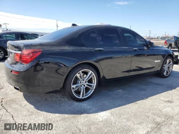 2014 BMW 7 Series 740i with VIN WBAYA6C52ED144317, listed as a Copart auction lot 87298375 with 135,888 mi miles and Salvage title. Bid and sale history available at DreamBid. Image 3.