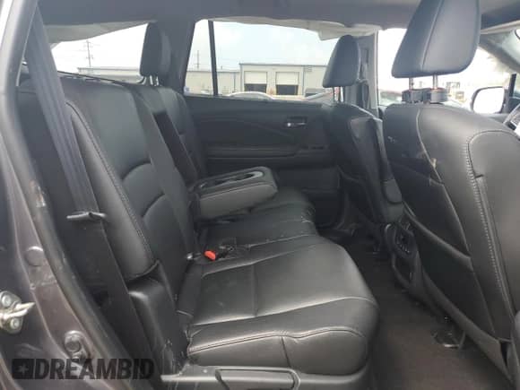 2020 Honda Pilot EX-L z VIN 5FNYF6H5XLB028351, wystawiony jako Copart lot #68930775 z przebiegiem Nie podano mil oraz Szkoda całkowita • Salvage title. Historia ofert i sprzedaży dostępna na DreamBid. Obrazek 11.