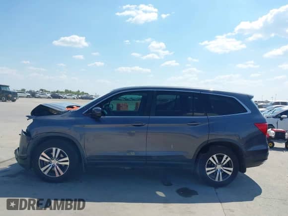 2017 Honda Pilot EX-L with VIN 5FNYF5H58HB027491, listed as a IAAI auction lot 43356758 with 124,805 mi miles and . Bid and sale history available at DreamBid. Image 15.