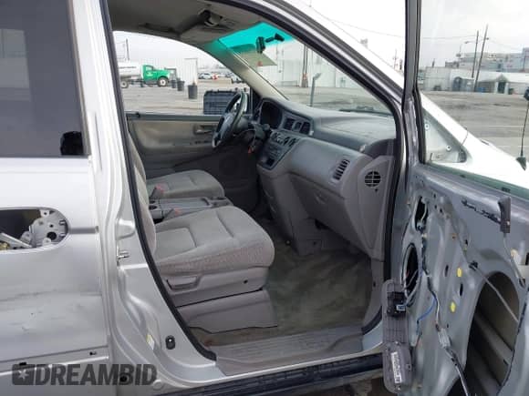 2004 Honda Odyssey LX with VIN 5FNRL18524B042391, listed as a IAAI auction lot 43280655 with 165,252 mi miles and . Bid and sale history available at DreamBid. Image 5.