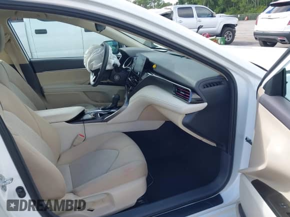 2021 Toyota Camry LE with VIN 4T1C11AK8MU601313, listed as a IAAI auction lot 43383218 with 34,384 mi miles and . Bid and sale history available at DreamBid. Image 5.