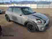 2015 MINI Hardtop with VIN WMWXM5C50FT937233, listed as a Copart auction lot 50077295 with 87,785 mi miles and Salvage title. Bid and sale history available at DreamBid. Image 4.
