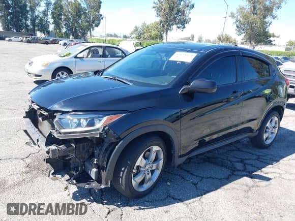 2021 Honda HR-V LX with VIN 3CZRU6H30MM739590, listed as a IAAI auction lot 43029474 with 74,490 mi miles and . Bid and sale history available at DreamBid. Image 18.