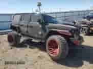 2021 Jeep Wrangler Unlimited Sahara Altitude z VIN 1C4HJXEG4MW731421, wystawiony jako Copart lot #54960915 z przebiegiem 105 243 mil mil oraz Szkoda całkowita • Salvage title. Historia ofert i sprzedaży dostępna na DreamBid. Obrazek 4.